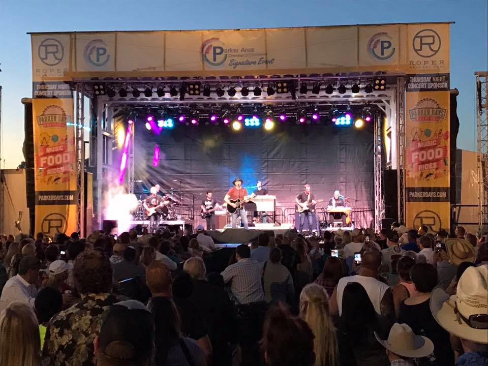 Parker Days festival, large Apex stage with full band performing at sunset