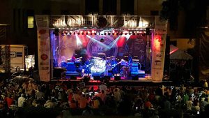 APEX 3224 GEN5 mobile stage at the Steel City Jazz Festival, with a band performing to a large seated crowd